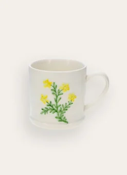 MUG EN GRÈS FLEUR EMBOSSÉE PEINTE MAIN JAUNE