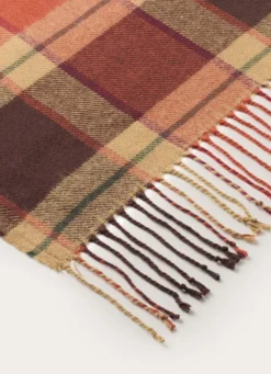 PLAID À CARREAUX AVEC FINITIONS FRANGÉES ROUILLE