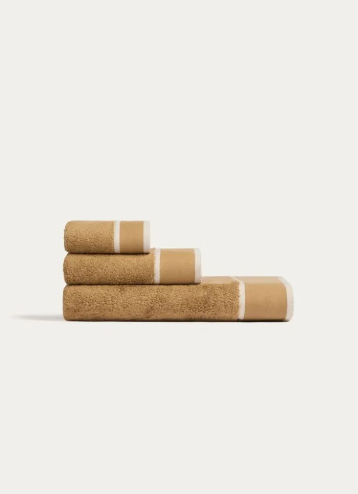 SERVIETTE DE TOILETTE UNIE À LARGE BORDURE ARTHUR CARAMEL