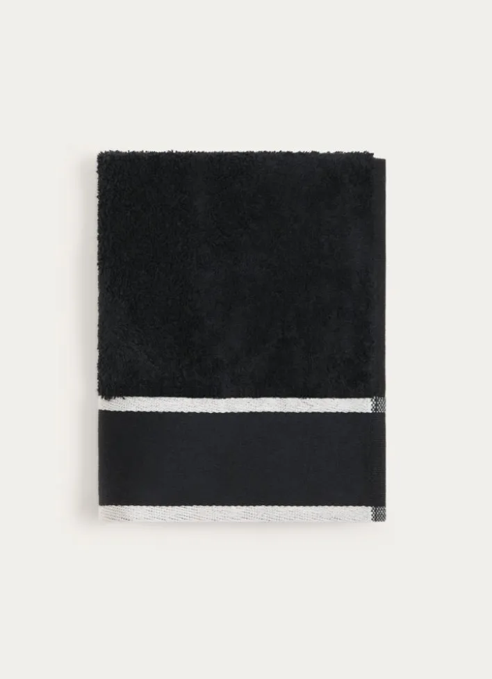 SERVIETTE DE TOILETTE UNIE À LARGE BORDURE ARTHUR NOIR