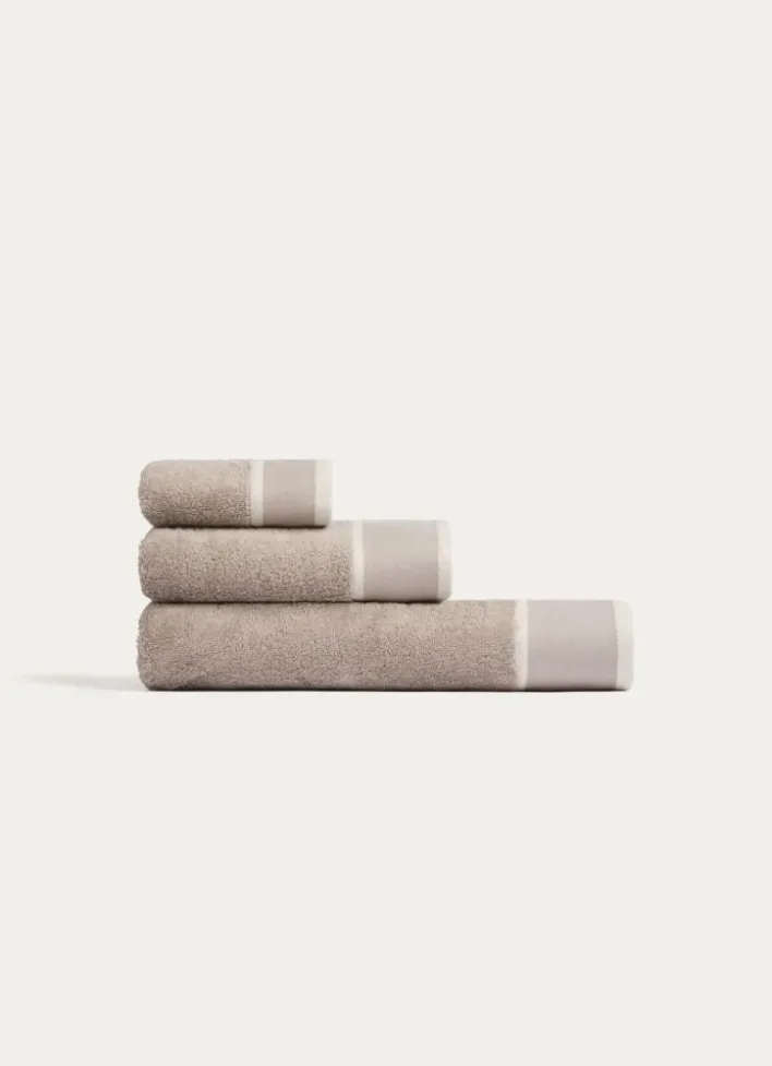 SERVIETTE INVITÉ UNIE À LARGE BORDURE ARTHUR BEIGE FONCÉ